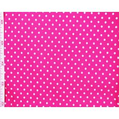 Cerise pink pin-dot fabric shown flat beside a measuring tape.