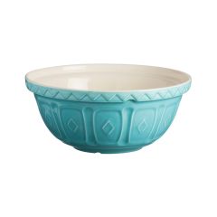 Turquoise ceramic mixing bowl with embossed diamond patterns and white interior. The bowl evokes a vintage aesthetic with its elegant design.