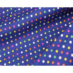 Electric blue fabric with tiny navy, white, and lime dots draped in soft folds.
