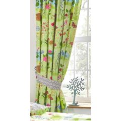 Cheerful green curtains with illustrated flowers, butterflies, and woodland creatures, tied with a daisy-patterned sash. Sunlight filters through a window.