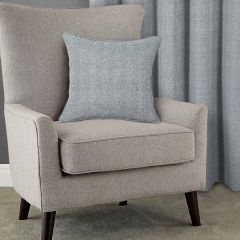 Showing the Arlo Sterling Cushion Cover on a chair