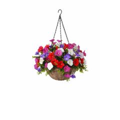Artificial hanging basket with mixed colour petunia flowers in wicker basket on white background