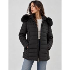 Model wearing the black padded jacket with the front zip open.