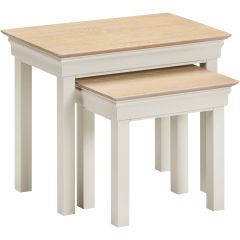 Bordeaux nest of tables in an ivory painted finish with contrasting oak-effect tops.
