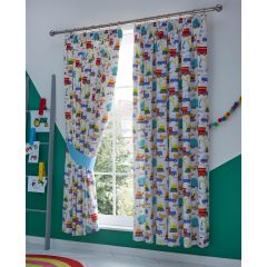 Colorful white curtains with playful transportation-themed patterns, covering a bright window in a cheerful room with green walls and a rainbow rug.