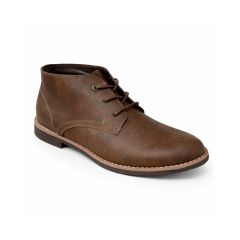 Men's brown leather chukka boot with three eyelet lacing, white stitching on the sole, and a rounded toe, exuding a casual and stylish look.