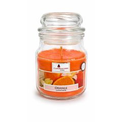 Frankincense and Myrrh scented candle in a glass jar with bright yellow wax