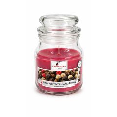 Frankincense and Myrrh scented candle in a glass jar with bright yellow wax