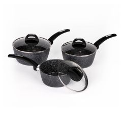 Three black speckled saucepans with black handles and clear lids are arranged on a white background, conveying a modern and functional kitchenware set.