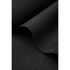 A close-up of a black fabric with a subtle textured weave. The fabric is partially folded, creating soft curves, conveying a sense of elegance and simplicity.