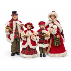 Set of four Christmas caroller family figurines wearing red and tartan outfits with cream faux fur trims