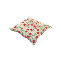 A square cushion with a pattern of red strawberries, green leaves, and small white flowers on a cream background, conveying a fresh, summery feel.