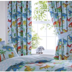 Bright children's room with dinosaur-themed curtains and bedding. The colorful dinosaurs are set against a light blue background, creating a playful and cheerful atmosphere.