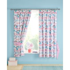 Children's room with pastel blue walls features a window adorned with colorful curtains. Decorated with unicorns, rainbows, and stars, creating a playful, whimsical atmosphere. A pink potted plant sits on the windowsill.