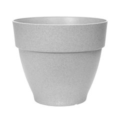 Elho grey textured round plant pot with purple salvia flowers on white background