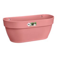 Elho pink rectangular balcony planter with red and purple geraniums on white background