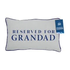 A rectangular cushion with the words "Reserved for Grandad" in bold blue text on a light background. A tag on the top right reads "Father's Day Grandad's Cushion."