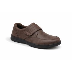 A brown leather shoe with a wide Velcro strap, featuring a slightly rugged sole. The shoe is clean and simple, conveying a formal yet comfortable style.