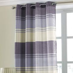 Grey and cream striped eyelet curtain panel hanging beside window