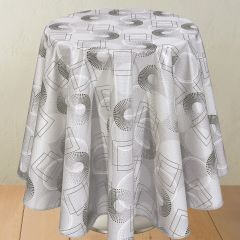 Grey geometric oil cloth with circular dot patterns and abstract rectangular shapes on a round table