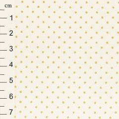 Cream fabric with small gold polka dots, shown beside a vertical centimeter scale from 1 to 7.