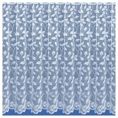 Jersey White plain net curtains sold by the metre hanging at a window