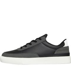 A sleek sneaker with a black perforated leather upper, gray suede trim, black laces, and a white rubber sole, conveys a modern, sporty vibe.