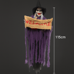 A Halloween witch decoration with a scary skull-like face, black pointed hat, long white hair, tattered purple robes, and a burlap sign reading 'WELCOME' on a plain white background