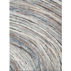 Full view of a modern swirl area rug with dynamic blue, orange, and cream tones