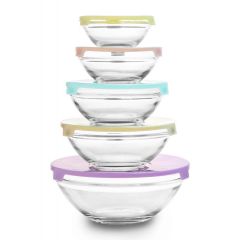 Stack of five glass bowls with colorful lids in pastel shades (green, peach, blue, yellow, purple) arranged largest to smallest. Clean, modern aesthetic.