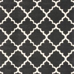 Black and cream Moroccan trellis rug with classic geometric pattern viewed from above.