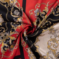 Twisted fabric featuring ornate gold chains and flourishes on red, black, and cream panels.