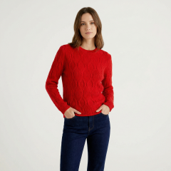Model wearing the Women's Swirl Jumper Red