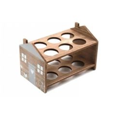 Wooden wine rack shaped like a house, with two shelves and circular cutouts for bottles. Decorated with a painted door and heart design.