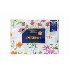 Floral sheet set package with colorful flowers on a white background. A navy label features "Sketchbook" in bold gold text, highlighting premium quality.