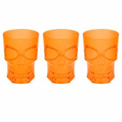 Three orange skull-shaped Halloween plastic cups arranged side by side on a white background for party table decorations