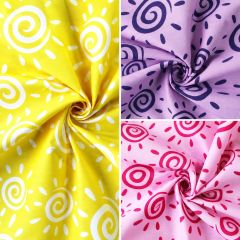 Swirly Suns polycotton fabric in Purple Yellow and Pink
