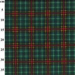 Green and red plaid fabric with yellow accents, featuring a centimeter scale on the left side.