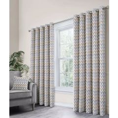 Natural Arcadia eyelet curtains with a grey and beige geometric pattern in a modern living room.