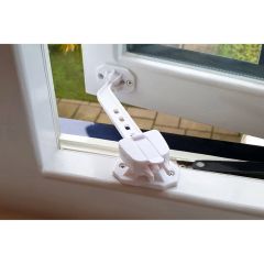 Clippasafe adjustable child safety window lock fitted to white window frame