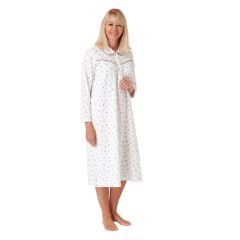 Woman wearing white cotton nightdress with red floral print, front view